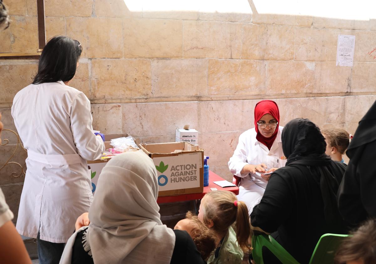 A Syrian midwife offering counseling to women